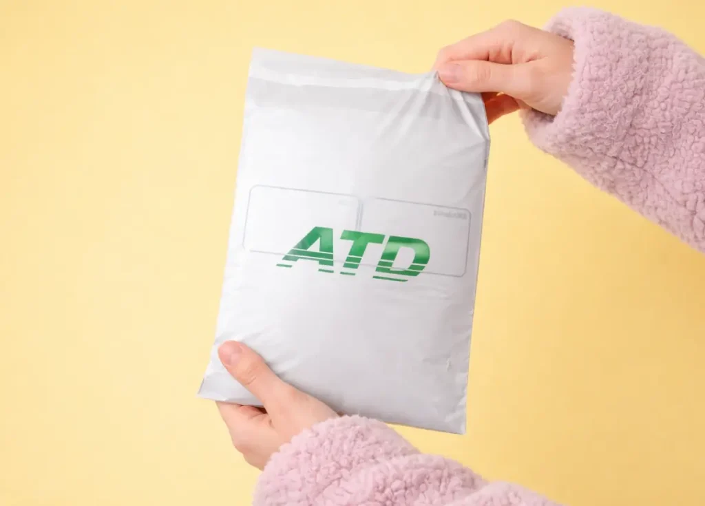 bantlı baskılı kargo poşeti logolu yapışkanlı kargo poşeti üretimi e ticaret poşeti imalatı dayanıklı bantlı poşet